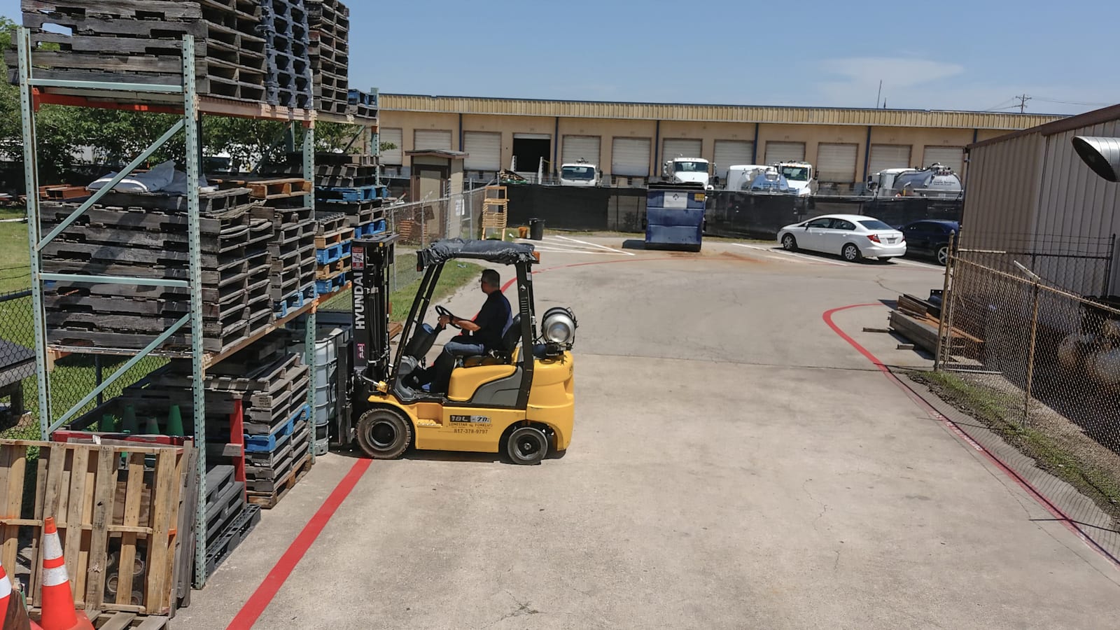 Student operating a forklift during certification